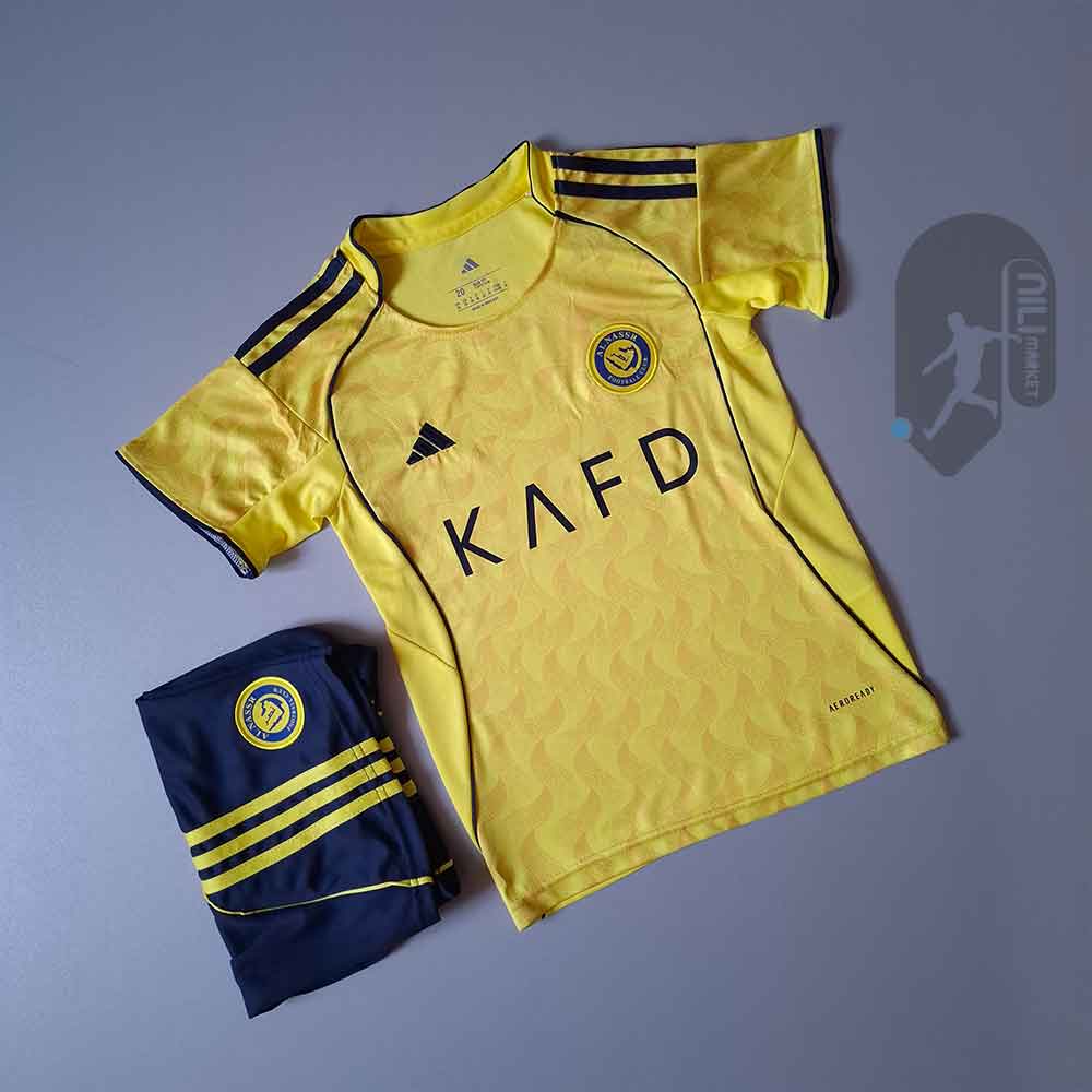 لباس اول النصر - بچگانه (ورژن هوادار  - فصل 2025/26) به همراه شورت ورزشی