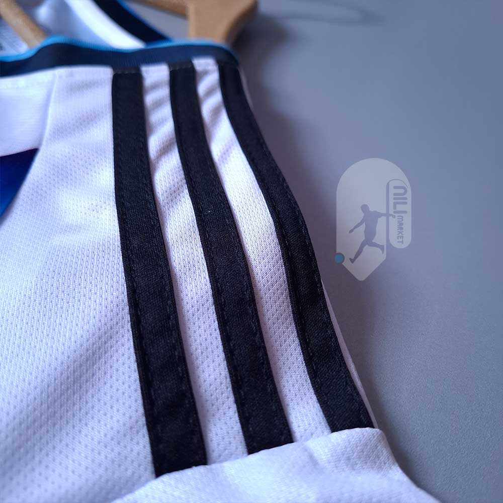 لباس اول آرژانتین (ورژن هوادار  -  سال 2026) به همراه شورت ورزشی