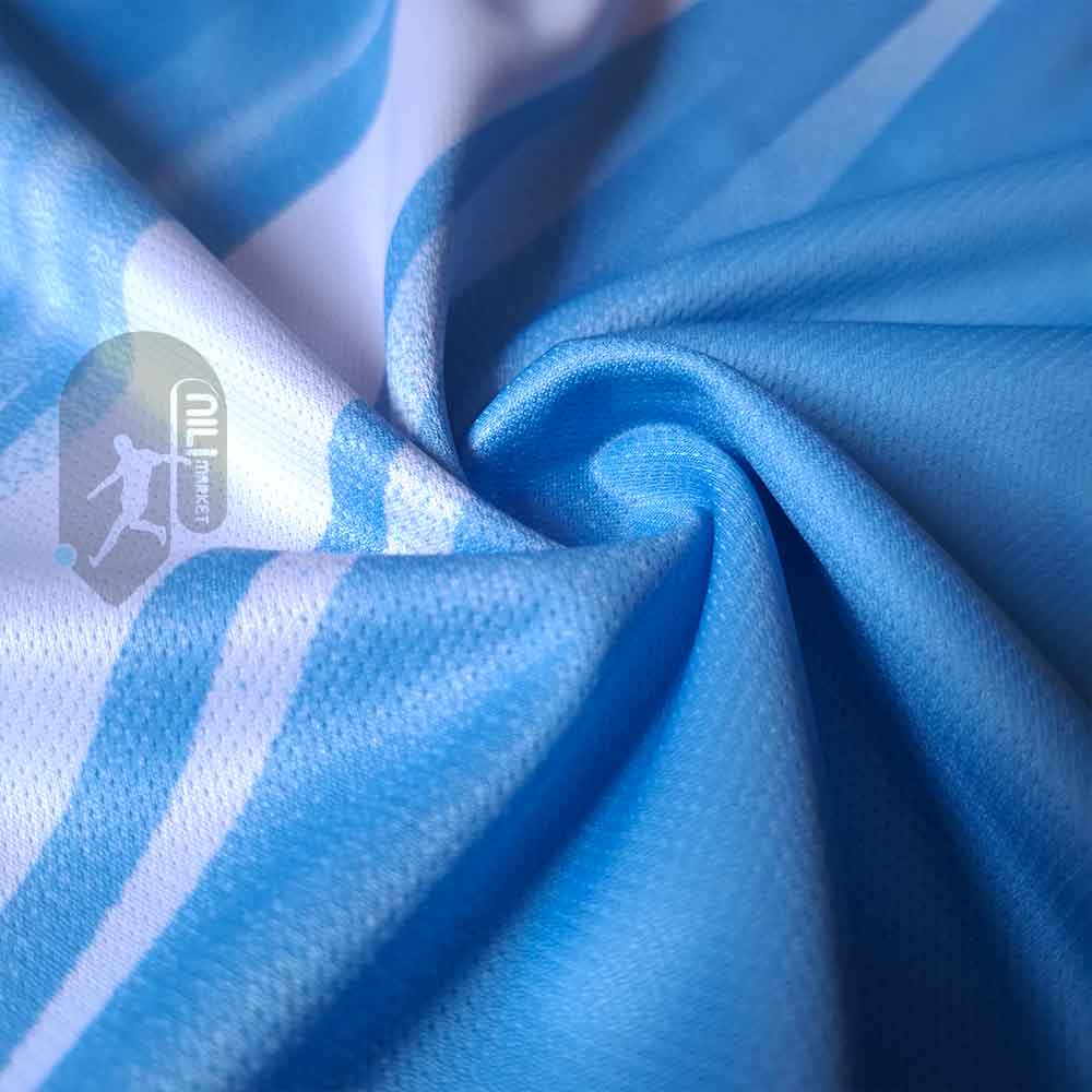 لباس اول منچسترسیتی (ورژن هوادار -  فصل 2025/2026) به همراه شورت ورزشی
